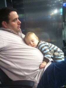 Daddy's make the best pillows especially in an airport.